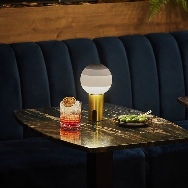 dipping light led portable table lamp by jordi canudas for marset