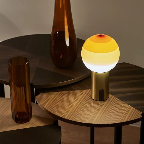 dipping light led portable table lamp by jordi canudas for marset