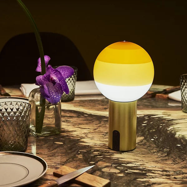 dipping light led portable table lamp by jordi canudas for marset