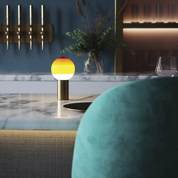 dipping light led portable table lamp by jordi canudas for marset